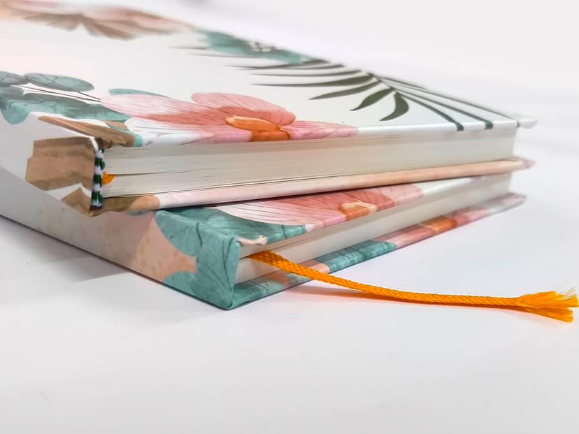 Close-up of the journal spine and the integrated yellow bookmark thread.