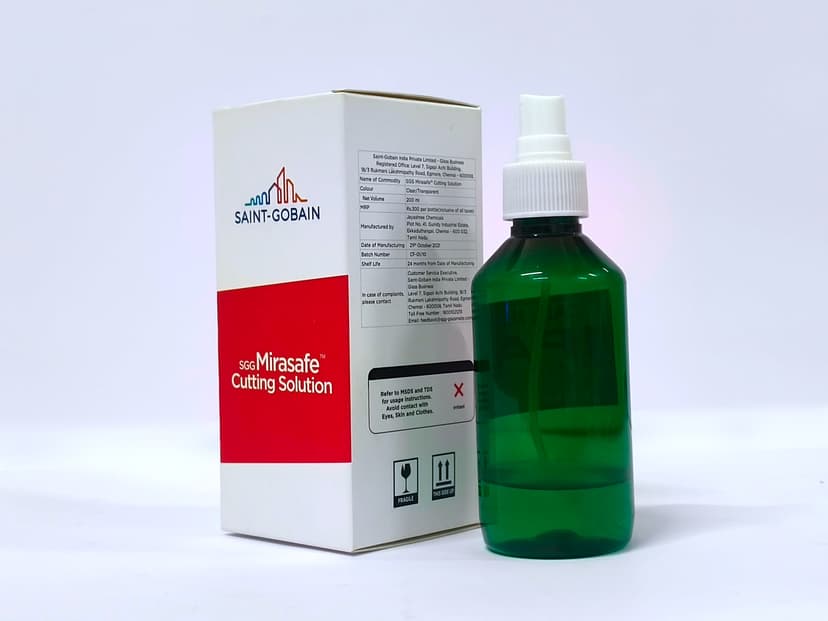 Saint-Gobain Mirasafe mono carton box next to its corresponding green spray bottle.