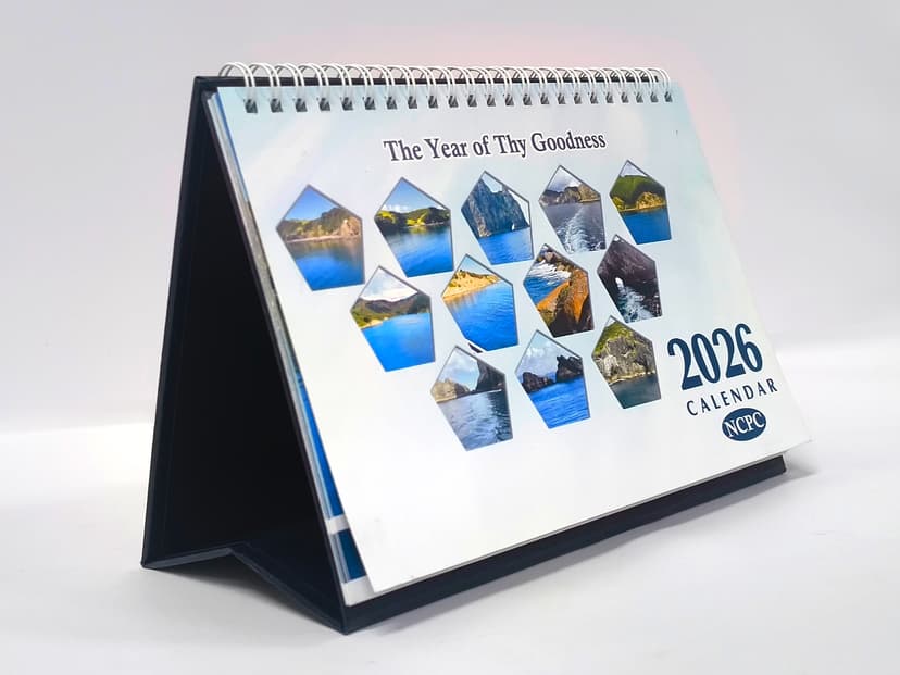 2026 Desk calendar with good cover design in landscape orientation.