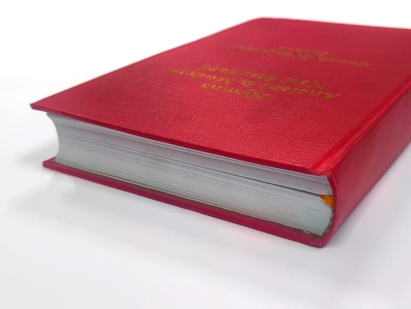 Close-up of the rounded corner and spine edge of the luxury case binding.