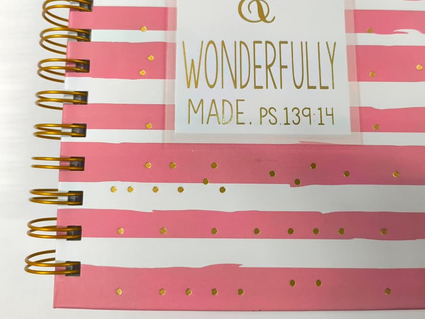 Close-up of gold foil stamping and debossing on the cover.